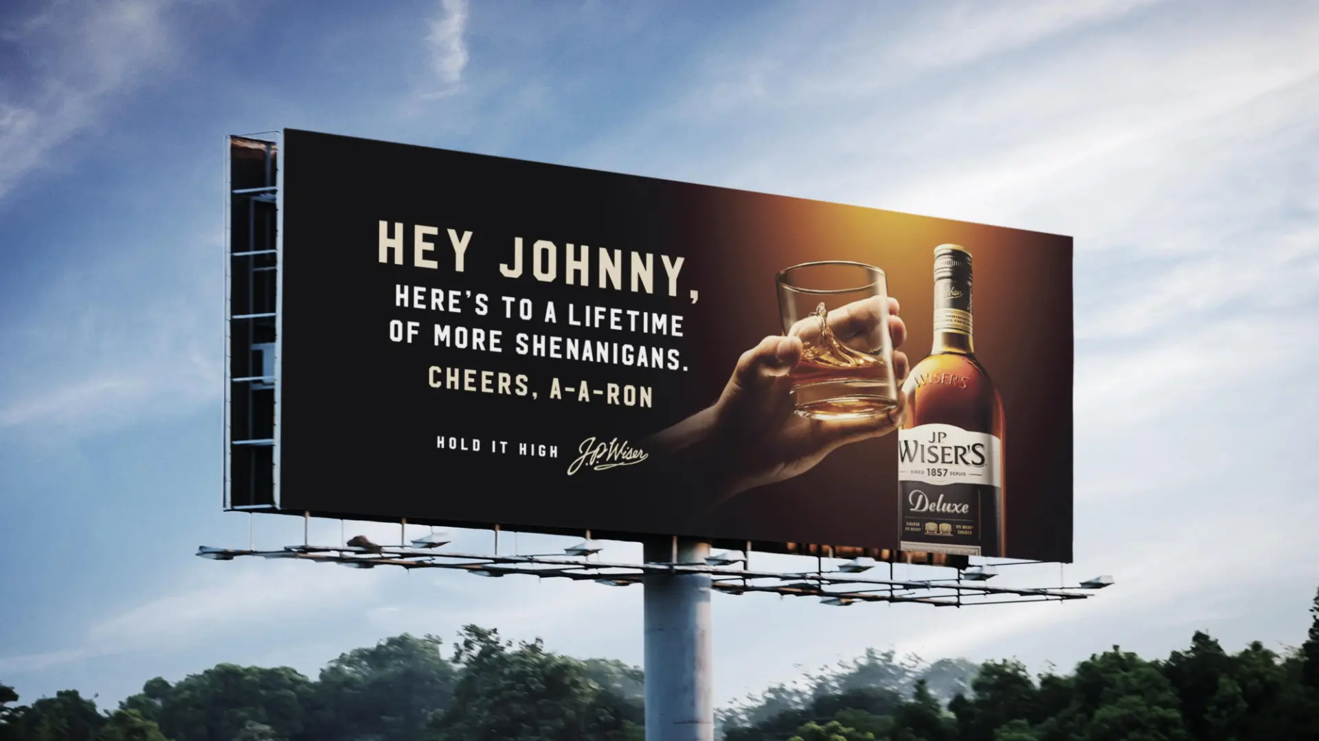 JP Wiser's whiskey billboard with bold creative against a blue sky